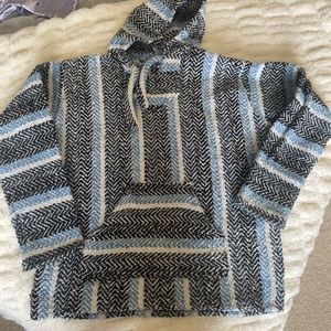 Blue, black and white drug rug